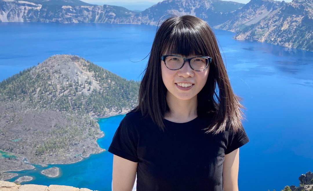 Smiling headshot of Zhirui Hu at Crater Lake