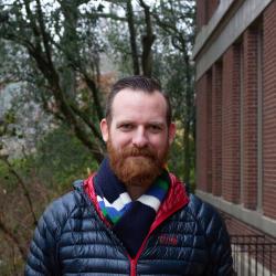 James Molyneux standing in front of Kidder Hall
