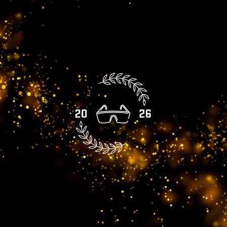 A black background with orange glitter and a pair of googles with the year 2026.