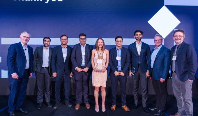 A group of people at a conference.